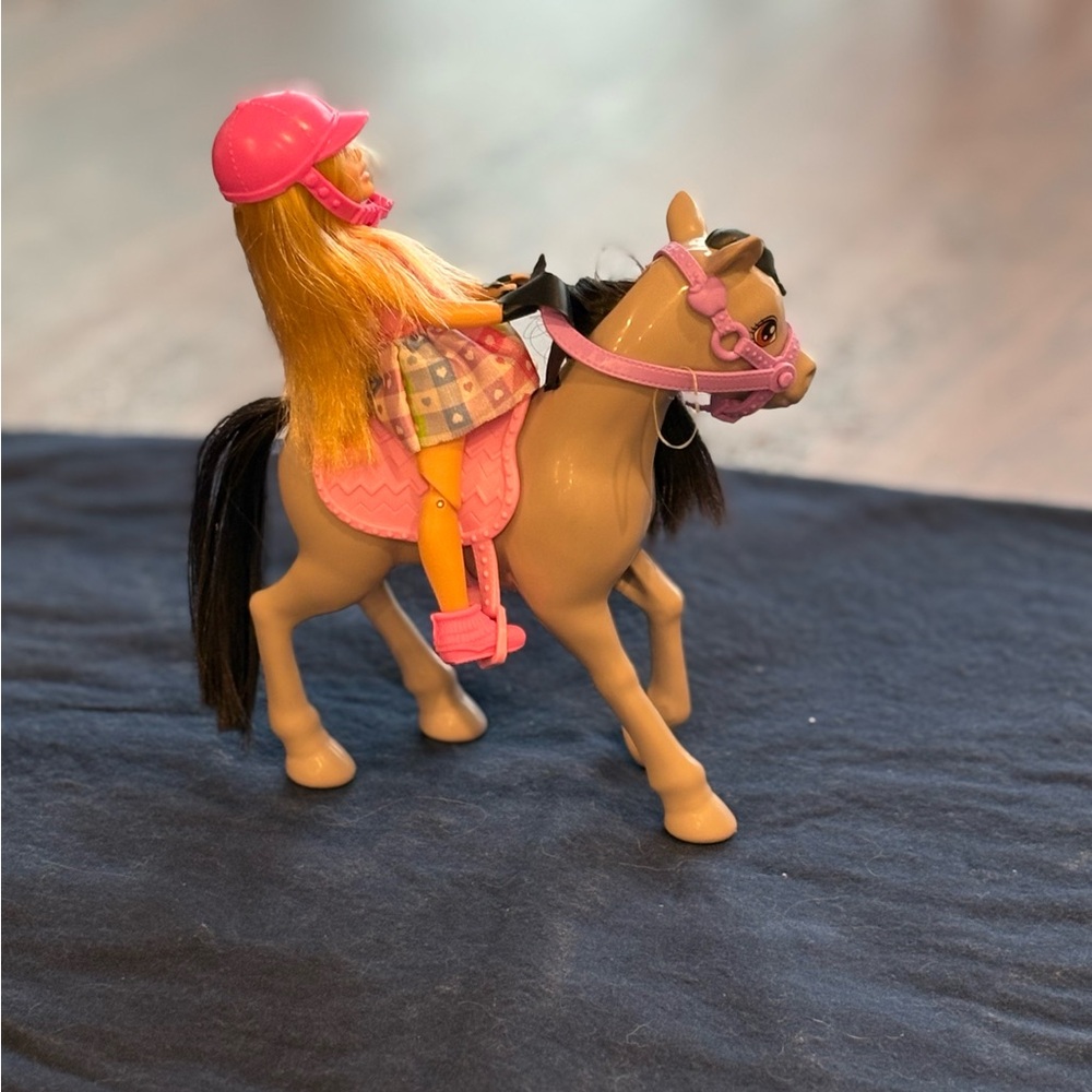 Pink and Tan Toy Horse with Rider